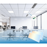 Office space with desks and computers, featuring a device with battery information and 2x4 led flat panel light with emergency battery backup on a blue banner